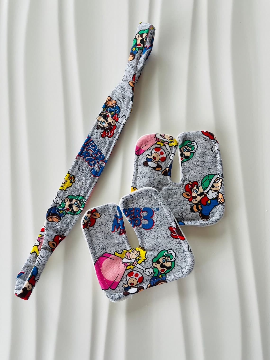 Custom Trach tie and Trach pads.